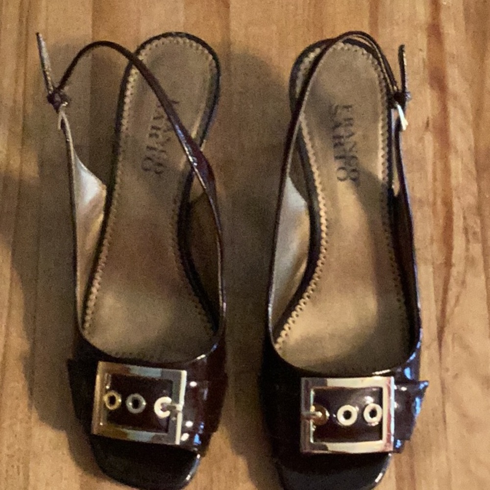 One pair of Franco Sarto pumps. Brown Patton Leather  with Gold Buckle.